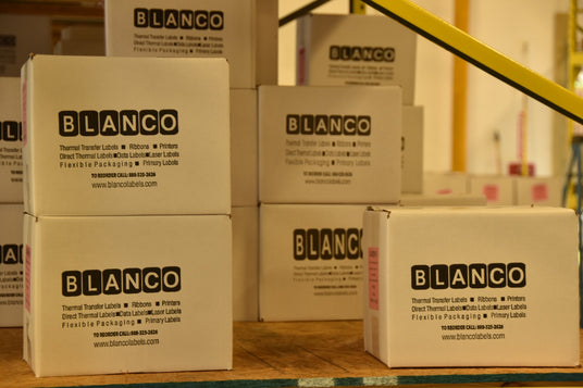 Blanco label boxes with labels in them